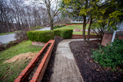 Concrete Walkway and Retaining Wall installation by D-Bug Waterproofing