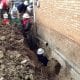 D-Bug Waterproofing crew hard a work on a home