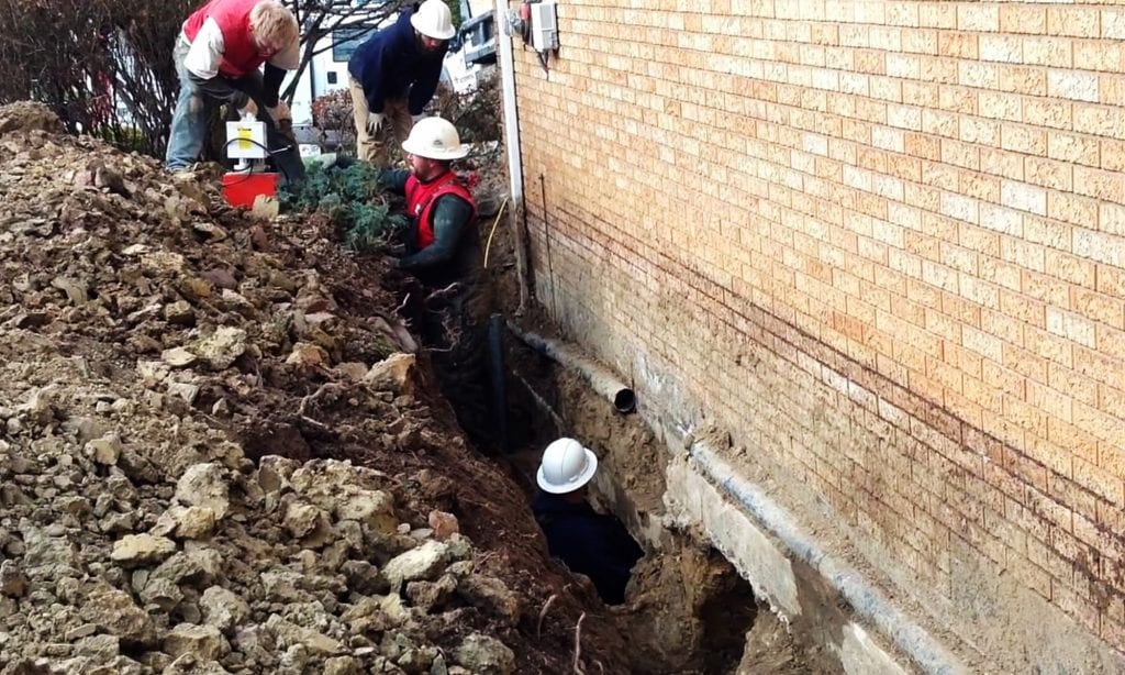 D-Bug Waterproofing crew hard at work