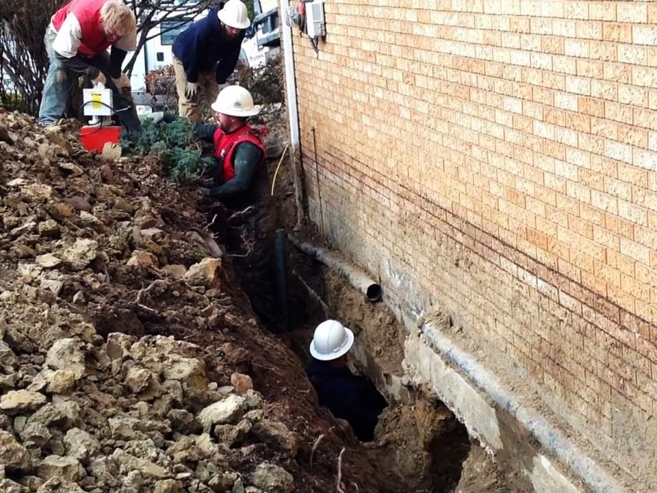 D-Bug Waterproofing crew hard at work