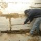 D-Bug Waterproofing digging french drain trench