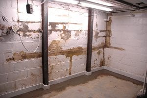 D-Bug Waterproofing installed steel beams to combat basement wall bowing