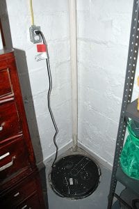 D-Bug Waterproofing sump pump installed in basement