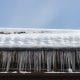 Ice dams on gutter of home