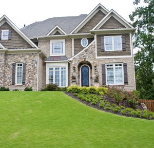 Home with landscape sloping away, good drainage