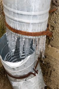 Broken gutter downspout