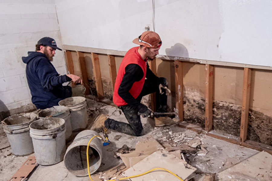 Ice around drain pipe foreshadows basement water problems